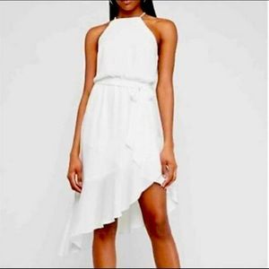 HIGH NECK ASYMMETRICAL FIT AND FLARE DRESS IN WHITE
